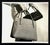 1964 purse black and white advertising photograph for Koret's. Publication information on the back. Combined shipping...