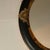 Vintage Oval Convex Mirror With Black and Gold Ornate Wooden Frame. For Sale - Image 9 of 12