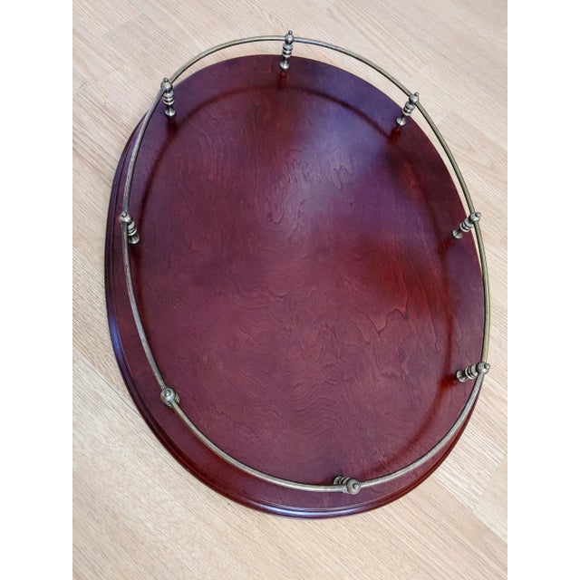 Here's a beautiful serving tray produced in Taiwan for The Bombay Company, 1988. This features mahogany wood and brass...