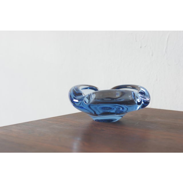 The glass bowl designed by Per Lütken for Holmegaard is one of the most recognizable examples of Danish art glass of the...