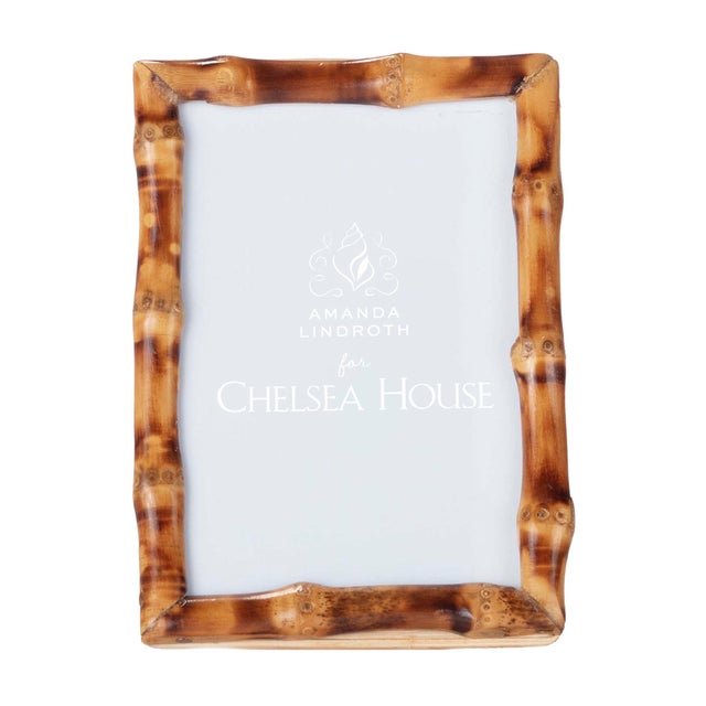 These four styles of organic picture frames are handmade of short-knot bamboo, the section of stalk hidden beneath the...