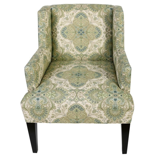 A pair of vintage Donghia armchairs, recently reupholstered in a green and blue medallion paisley fabric that beautifully...