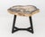 Contemporary Resin and Petrified Wood Live Edge Side Table, mounted on gray patinated steel base. 18.5" H x 24" W x 20.25"...