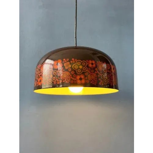Mid century Arabia pendant lamp by Kaj Franck for Fog and Mørup. The lamp has a brown and orange enamel layer and is made...