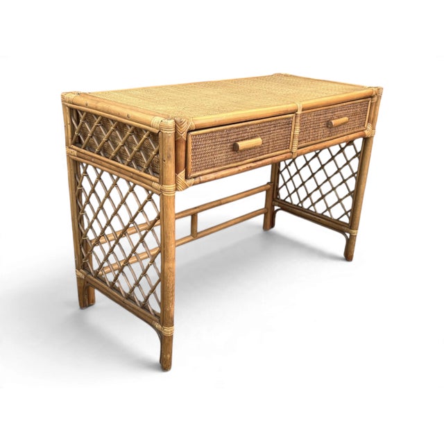 This rattan vanity desk brings natural texture and relaxed elegance to a bedroom, dressing area, or home office. The warm...