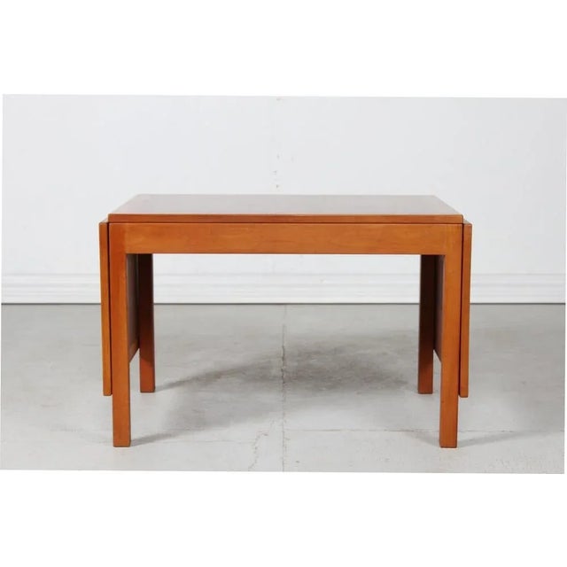Danish vintage Børge Mogensen extendable coffee table model no. 5360 made of American walnut, solid and veneer with oil...