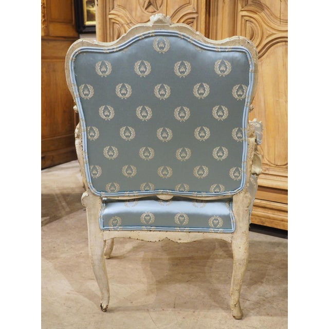 18th Century French Painted Louis XV Fauteuil À La Reine Armchair With Blue Silk For Sale - Image 4 of 18