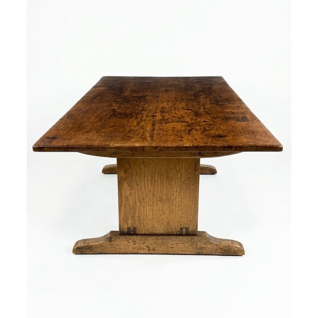 Richly grained walnut trestle cocktail/coffee table with drawer, designed and built for the estate of Gregory Peck by...