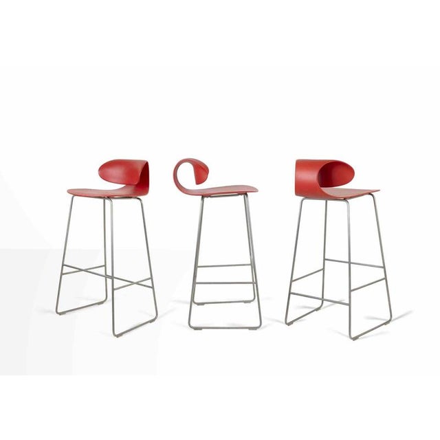 Set of 7 Red Maxima Benches is a design item realized by William Sawaya & Paolo Moroni. Set of 7 bar stools in molded...