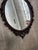 Up for your consideration is a beautiful vintage wooden hand carved oval wall mirror. This would look lovely in your home...