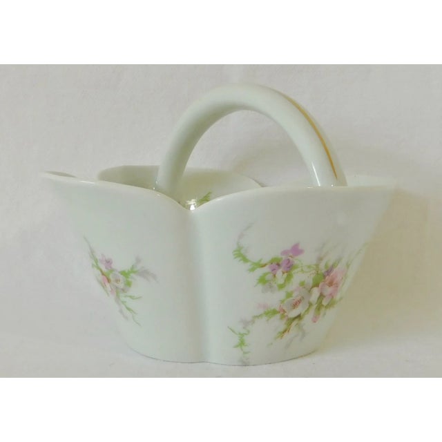 Beautiful small antique Haviland Limoges pink flowers porcelain basket. Made in France - Circa 1962.