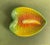 A classic botanical ceramic accent dish depicting a beautiful textured anthurium flower native to Hawaii in the vivid...