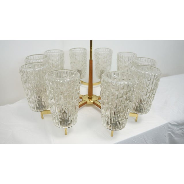 Ultra-rare collectors piece. Elevate your living space with the exquisite Mid-Century Modern Chandelier designed by the...