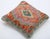 A one-of-a-kind handwoven Afghan wool kilim accent pillow featuring layered diamond medallion. Cut and sewn by hand from a...