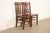 A gorgeous pair of antique Mission or Arts & Crafts period quarter sawn oak slat back side chairs or dining chairs In the...