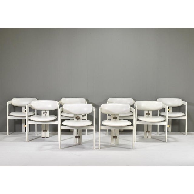 Introducing Pamplona Dining Chairs by Augusto Savini for Pozzi, 1965 – Set of 8 The chairs represent a harmonious blend of...