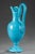Charles x light-blue opaline ewer with a high handle and resting on a circular foot. Its delicate color and the purity of...