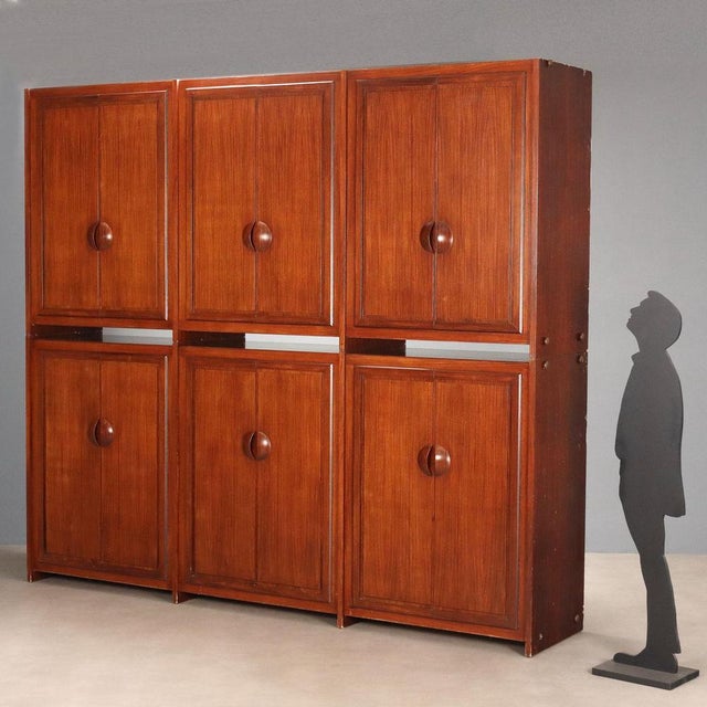 Wardrobe with 6 plus 6 hinged doors; internally it features a chest of drawers, shelves and clothes rails. This piece is...