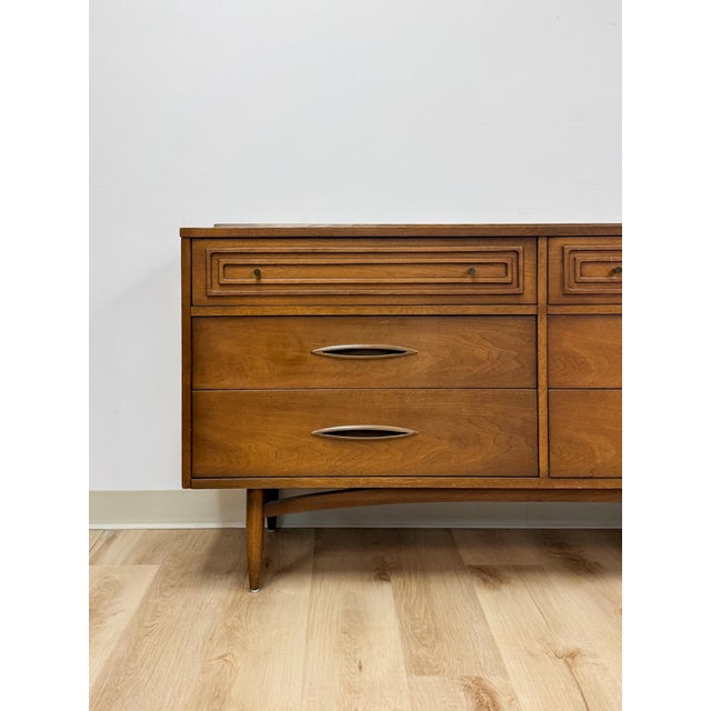This striking vintage Broyhill Premier Sculptra six drawer lowboy dresser is one of the most actively collected and sought...