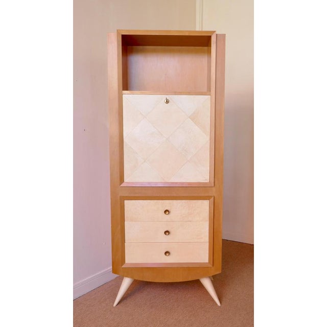 Blanche klotz (attributed to) ash chest of drawers, tapered legs mounted at an angle and covered in parchment, 3 drawers...