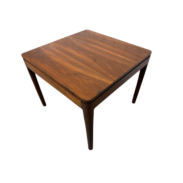 Elevate your space with this authentic Mid-Century Modern Drexel Declaration walnut side table, designed during the iconic...
