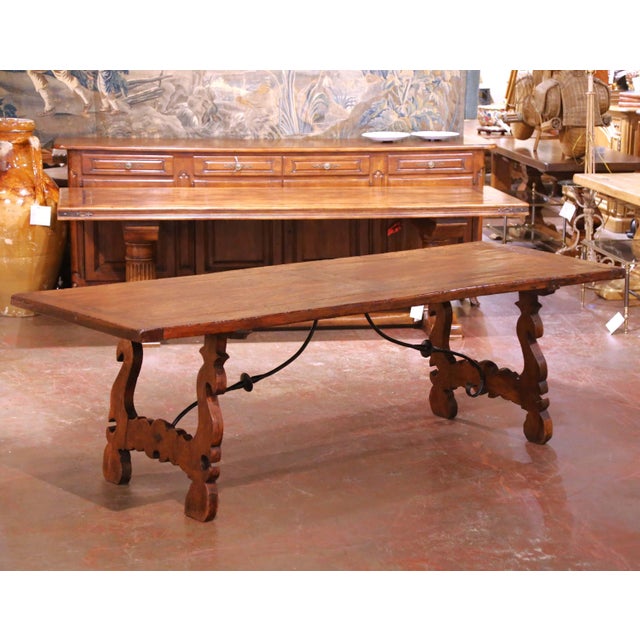 This exceptional antique 18th century Spanish refectory table, crafted in walnut circa 1780, exemplifies the robust...