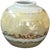 A beautifully executed vintage studio porcelain cabinet vase featuring a classic globe form finished in a luminous...