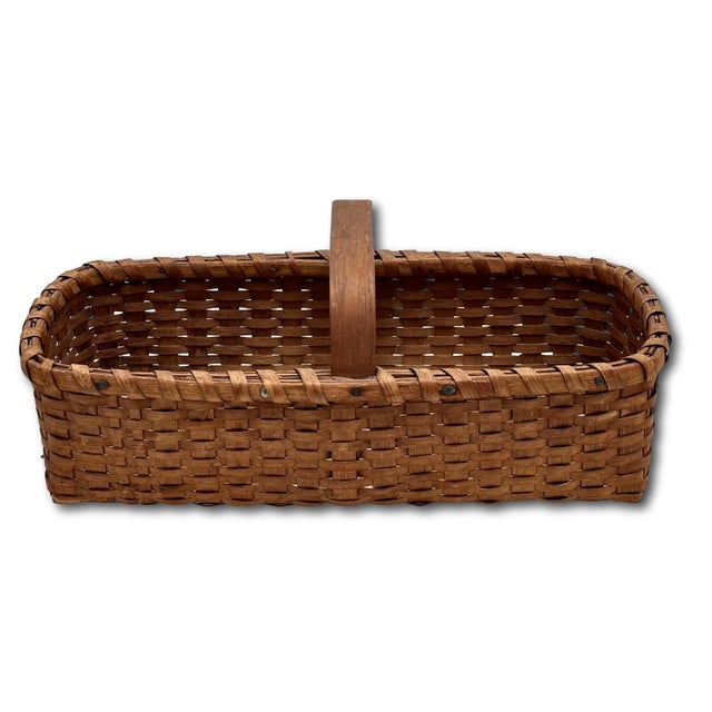 This is an Outstanding Example of an Authentic American Primitive Small Size Egg Gathering Basket. Circa Late 19th...