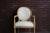 Capturing French Provincial attitude perfectly is the Francesca arm chair by Ethan Allen. The hand carved Italian Frame is...