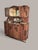 A representative Art Nouveau oak buffet, likely made around 1900–1915. This exceptionally large piece of furniture...