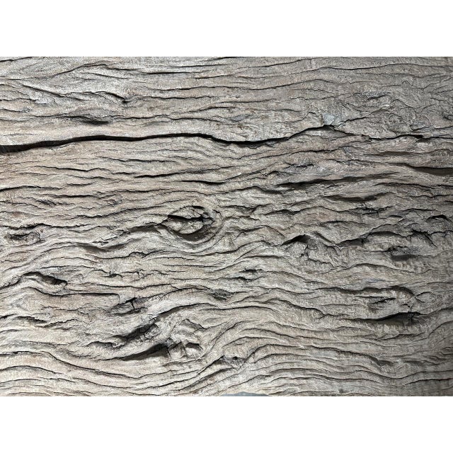 A single three inch thick slab of teak wood hand made into this beautiful coffee table or bench with unique natural...