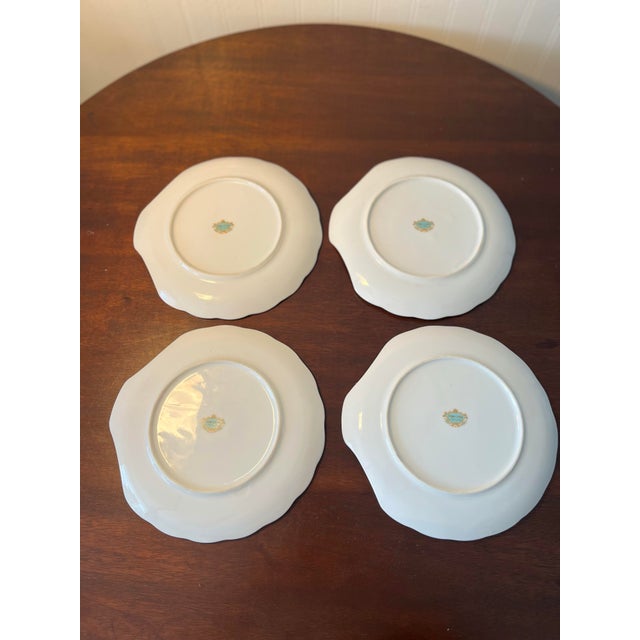 Vintage Yada Chintz snack plate set Of 4 . Scalloped , shell shape, gold trim . Purple flowers design . The plates do have...