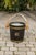 An English Champaign bucket made of oak with copper bands and a coat of arms from the late 19th century. This oak bucket...