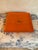 Vintage wooden hand painted lacquered Hermes inspired orange equestrian change catch all tray. Shiny durable finish. Great...