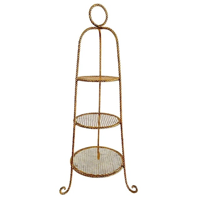 A beautiful 3-tier Italian etagere (or display stand) finished in a classic mi-century twisted rope design. The entire...