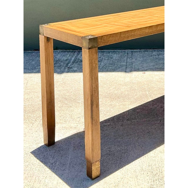 This striking 1970s console table seamlessly blends robust Campaign-style elements with the refined geometric appeal of...