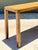 This striking 1970s console table seamlessly blends robust Campaign-style elements with the refined geometric appeal of...