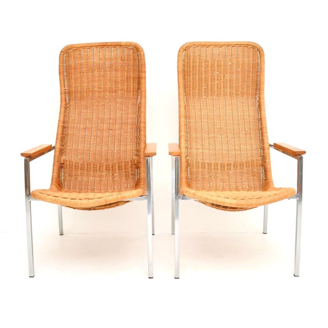 A stunning pair of vintage chrome & Rattan armchairs by Dirk Van Sliedrecht, made in Holland in the 1960’s and made by...