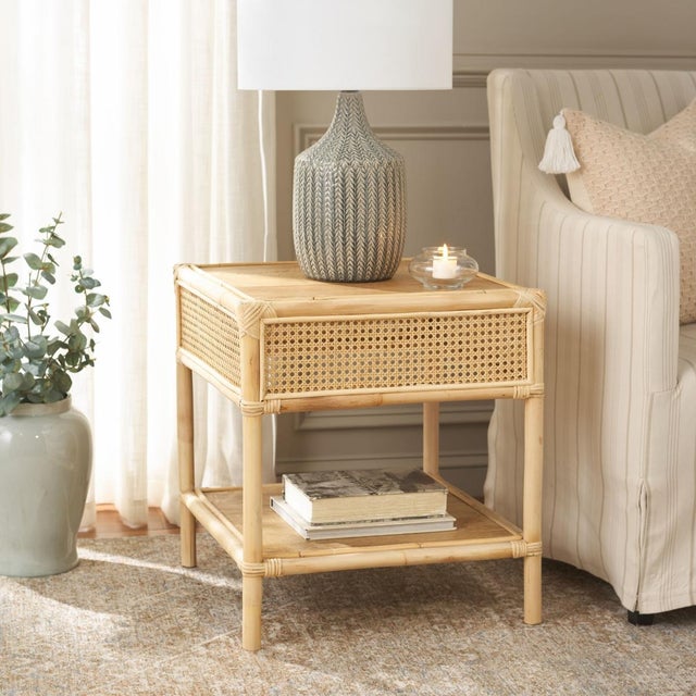 Introducing the Arvid Square Accent Table, refined and simplistic in its design, featuring eye-catching natural colors....