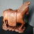 Hand carved vintage Chinese folk art. Wooden horse with glass eyes. Believed to be from China circa 1940s. Damage to one...