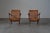 Rattan arm chairs The chairs are in a very good condition with traces of usage normal to their age. Some of the webbing...