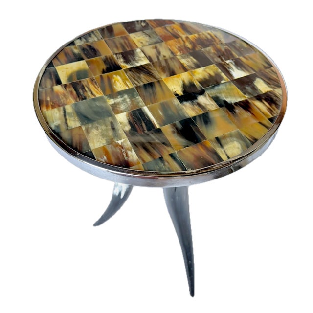 Vintage chrome and horn side table with three prong horn legs. Table center surface is horn veneer in a mosaic...