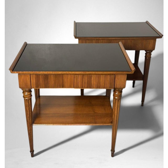 Elegant pair of Italian nightstands crafted between 1950 and 1958 in a distinguished artisan workshop in Cantù, a town in...