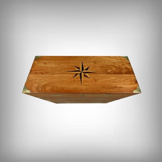 Inspired by the furniture of naval officers, this beautiful reproduction of a marine chest of drawers embodies the...