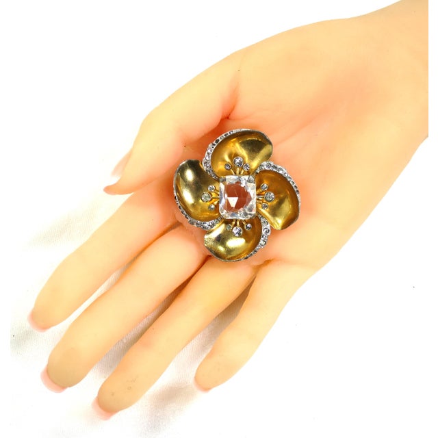 1940s designer Mazer gold-plated sterling crystal brooch. The three-dimensional design depicts a stylized flower bloom...