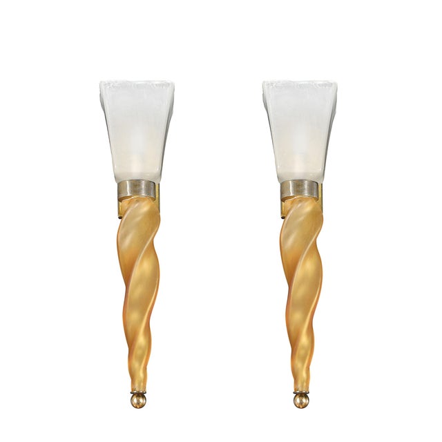 This remarkable pair of Mid-Century Modernist sconces hails from the renowned glassmaking workshops of Murano, Italy....