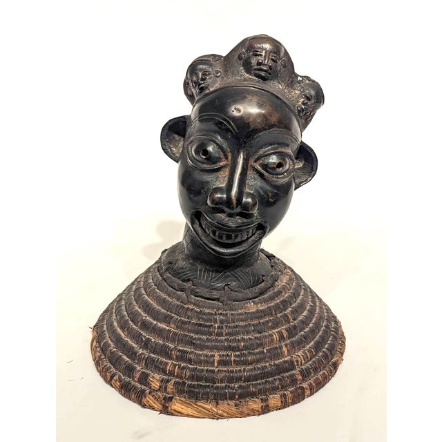 Offered is a cast bronze and coiled rope bust created in Benin during the late 19th Century and acquired at the Albert F...