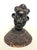 Offered is a cast bronze and coiled rope bust created in Benin during the late 19th Century and acquired at the Albert F...