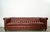 Vintage Hollywood Regency genuine leather couch for sale. This is a long Chesterfield sofa with the classic design and was...