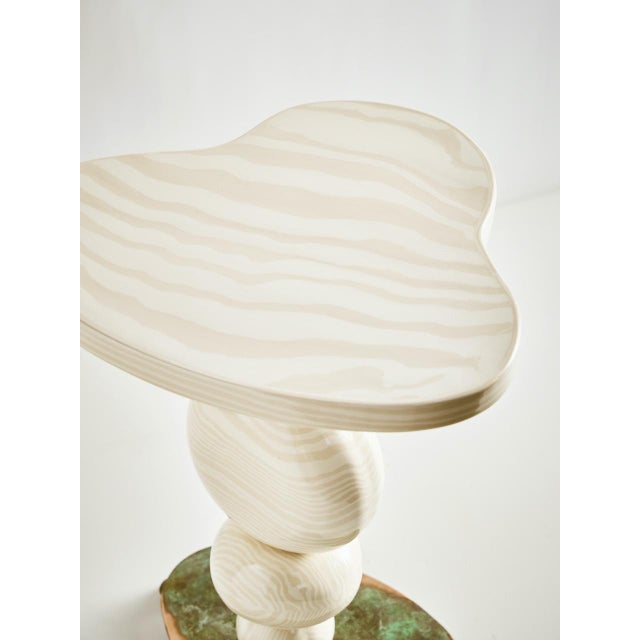 Elevate your space with the Alto Side Table. Hand built using traditional Nerikomi slab-building techniques. Ceramic...